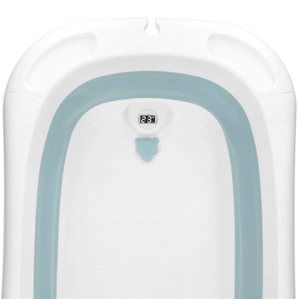 Cadita de baie pliabila pentru bebelusi cu termometru electronic LCD si perna de sustinere inclusa, capacitate 35 L, dop de scurgere, pentru copii pana la 12 luni, 82x52x22 cm, alb si albastru - imagine 29
